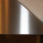 A dull polished stainless steel sheet with laser coating