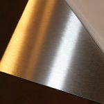 A satin polished stainless steel plate