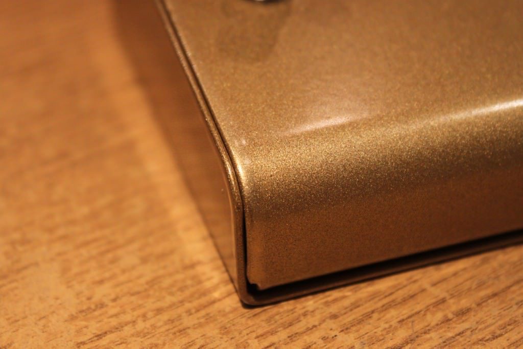 Metal case powder coated gold