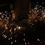 Laser cutter prepares to cut steel sheet metal
