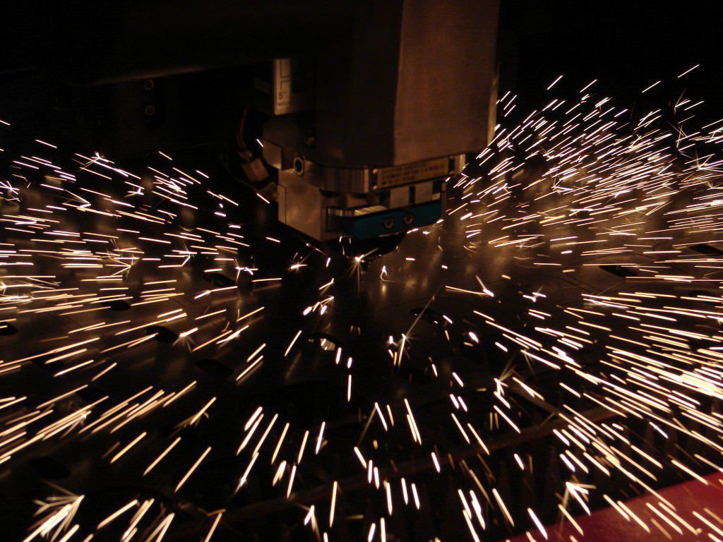 A laser cutter and mild steel material