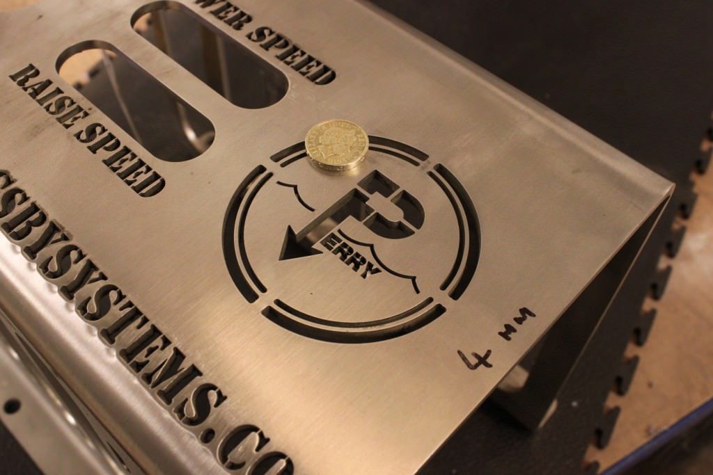 Small details laser cut in stainless steel sheet metal