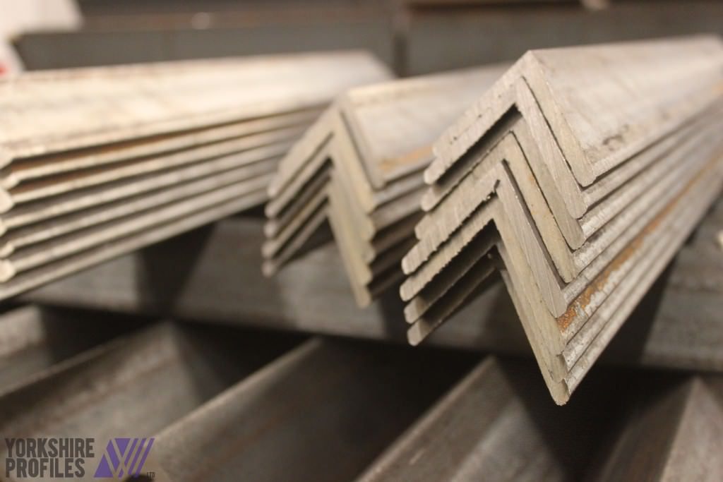 Steel angles cut on band saw